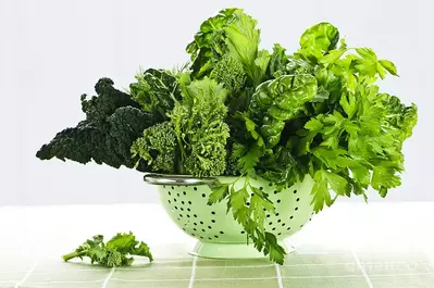 dark-green-leafy-vegetables-in-colander-elena-elisseeva