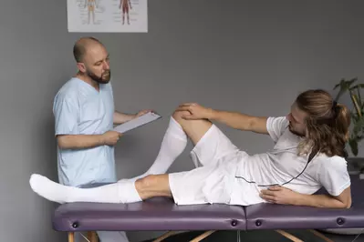 physiotherapist with patient