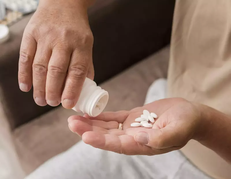 hand holding pills