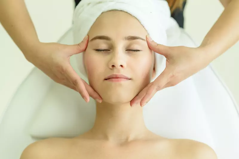 woman getting temple massage